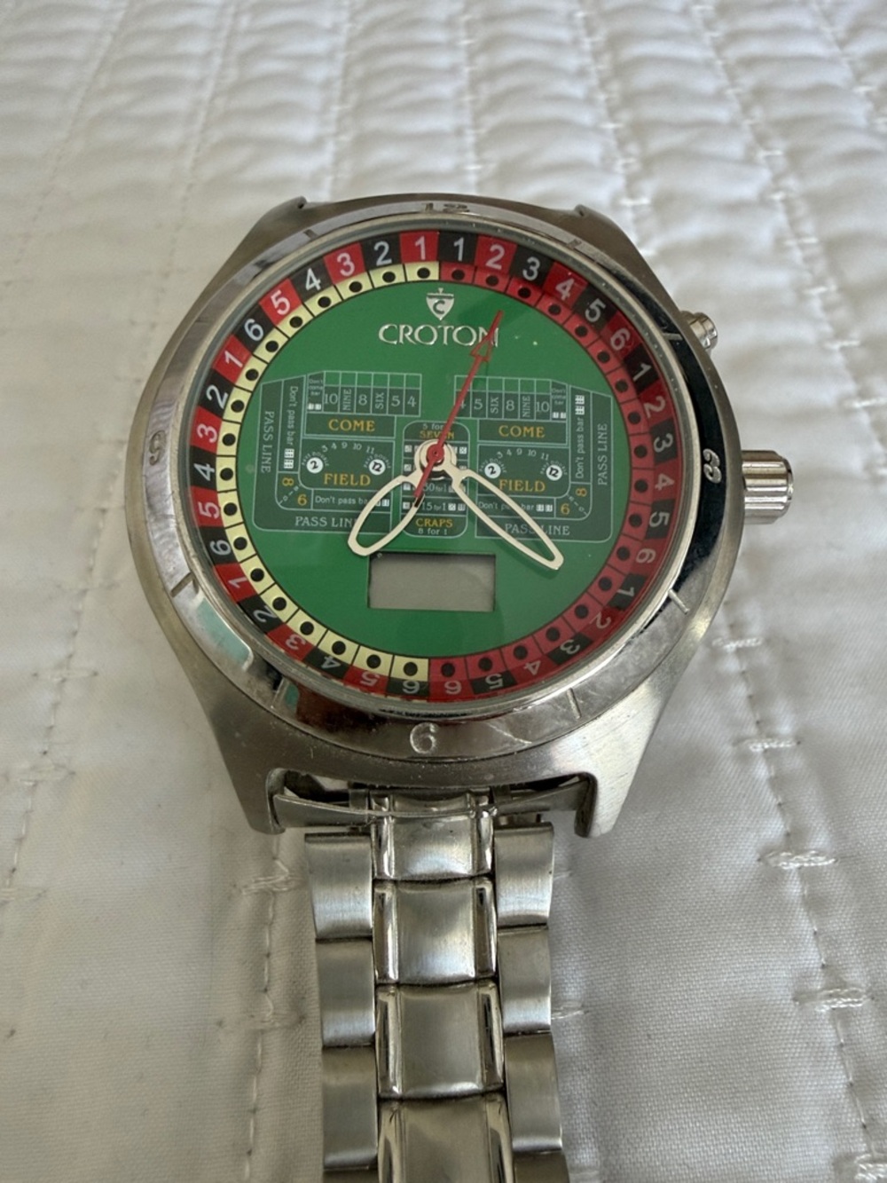 Croton Stainless Steel Watch with Green Dial and Red Accents